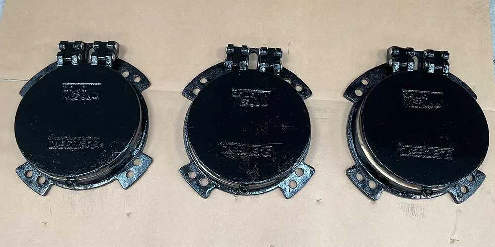 Black double hinge flap valves.
